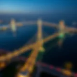 Aerial view of Reem Island bridges illuminated at night