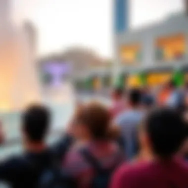 Visitors captivated by the Dubai Mall Fountain Show during a vibrant performance