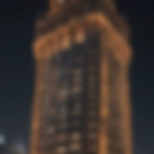 A stunning view of the National Tower illuminated at night, showcasing its architectural elegance.