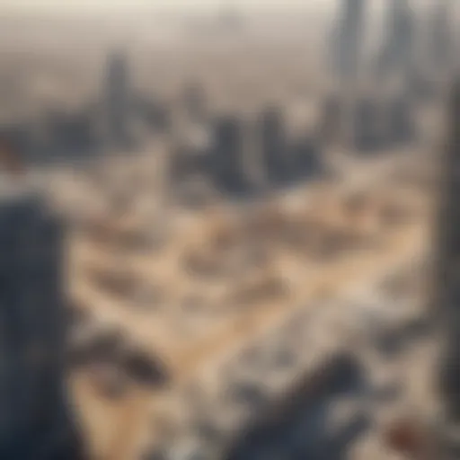 Aerial view of a construction site in Dubai showcasing cranes and buildings